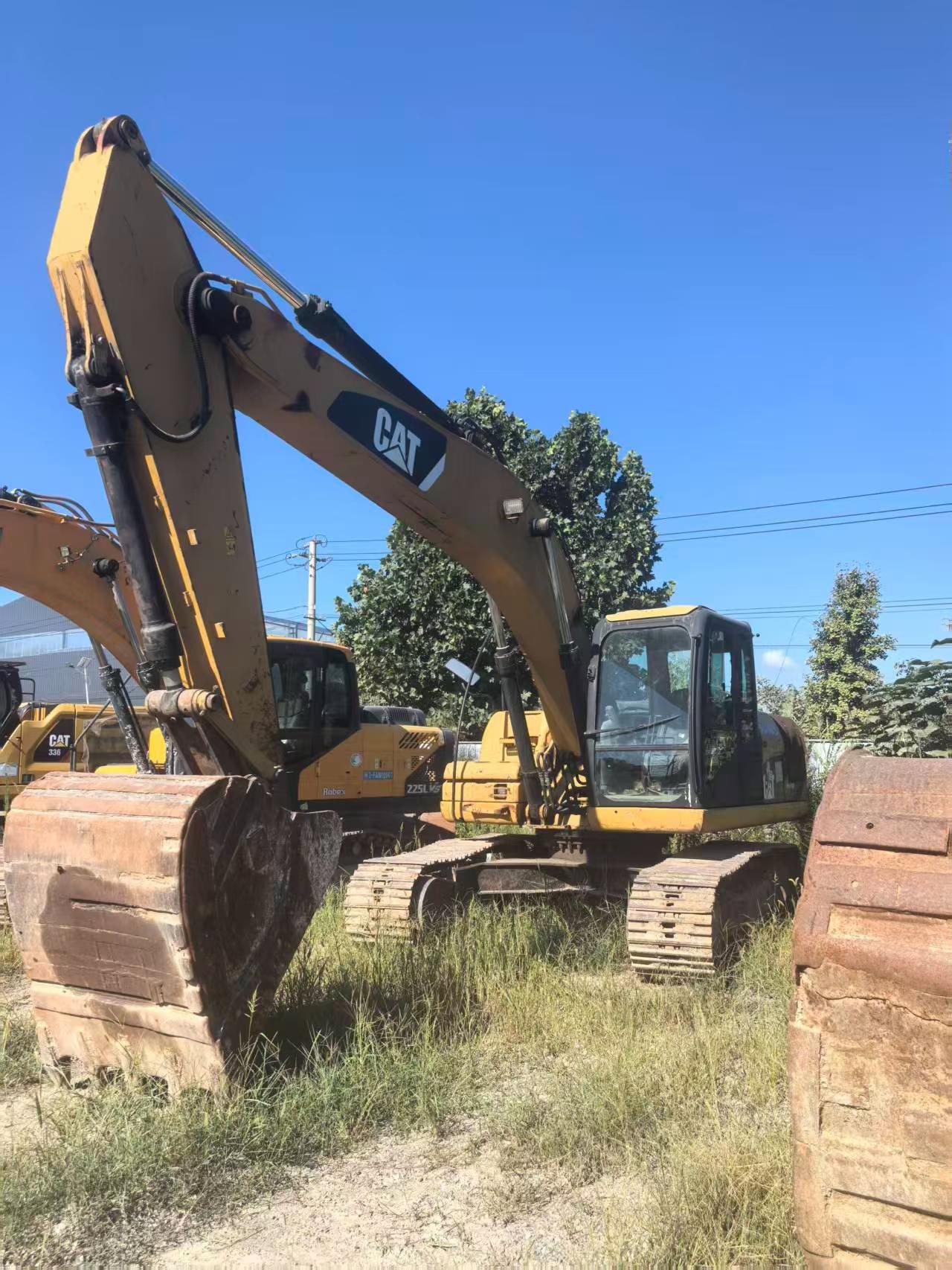 2011 год Caterpillar 323D б/у экскаватор