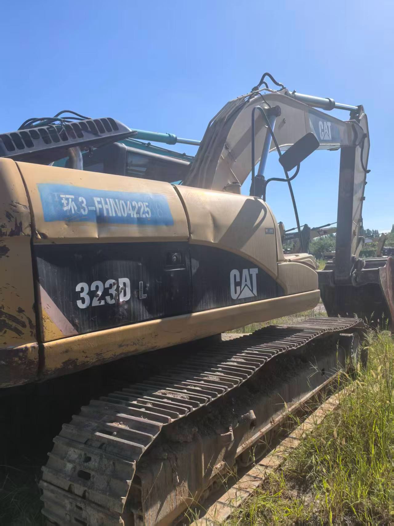 2011 год Caterpillar 323D б/у экскаватор